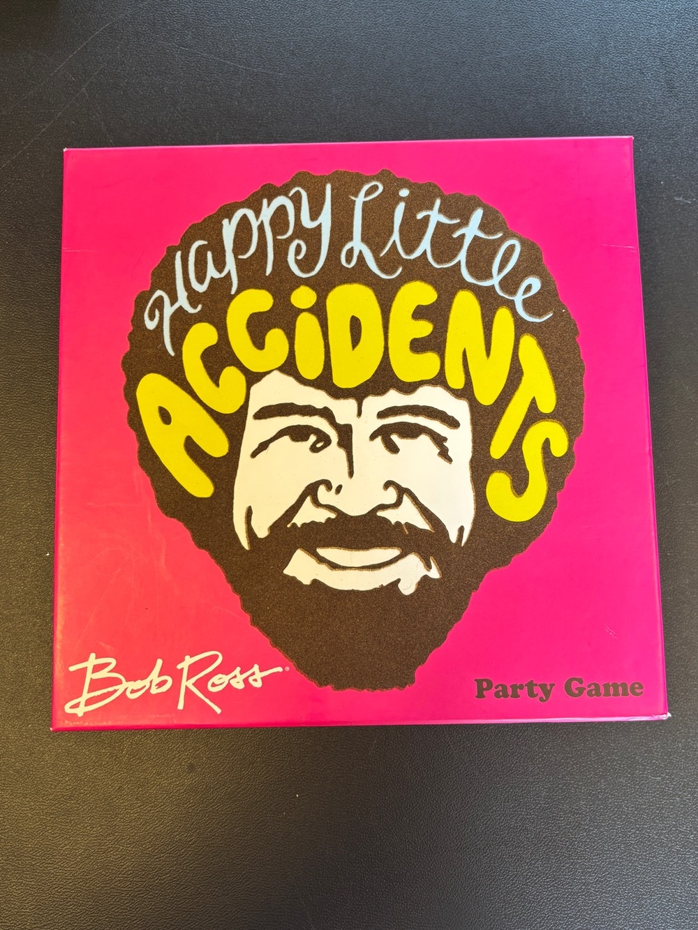 Bob Ross Happy Little Accidents Party Game - Pink & Yellow Box